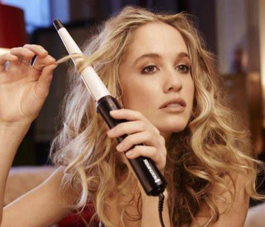 Use a curling iron to create natural curls