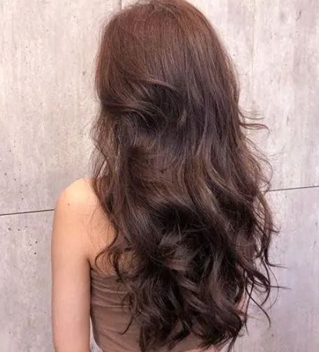 Curl your hair with a curling iron