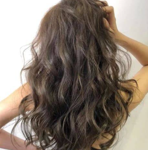 Curling hair with a curling iron for dry hair
